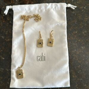Gold necklace and earrings w/black or navy stone